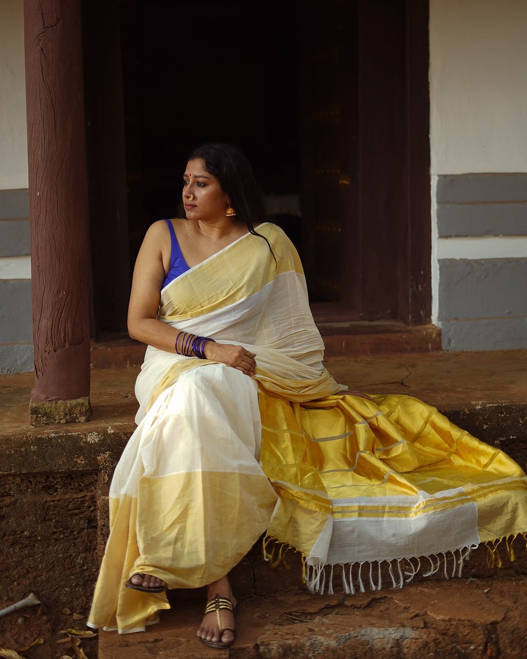 MALAYALAM ACTRESS ANUMOL STILLS IN WHITE SAREE